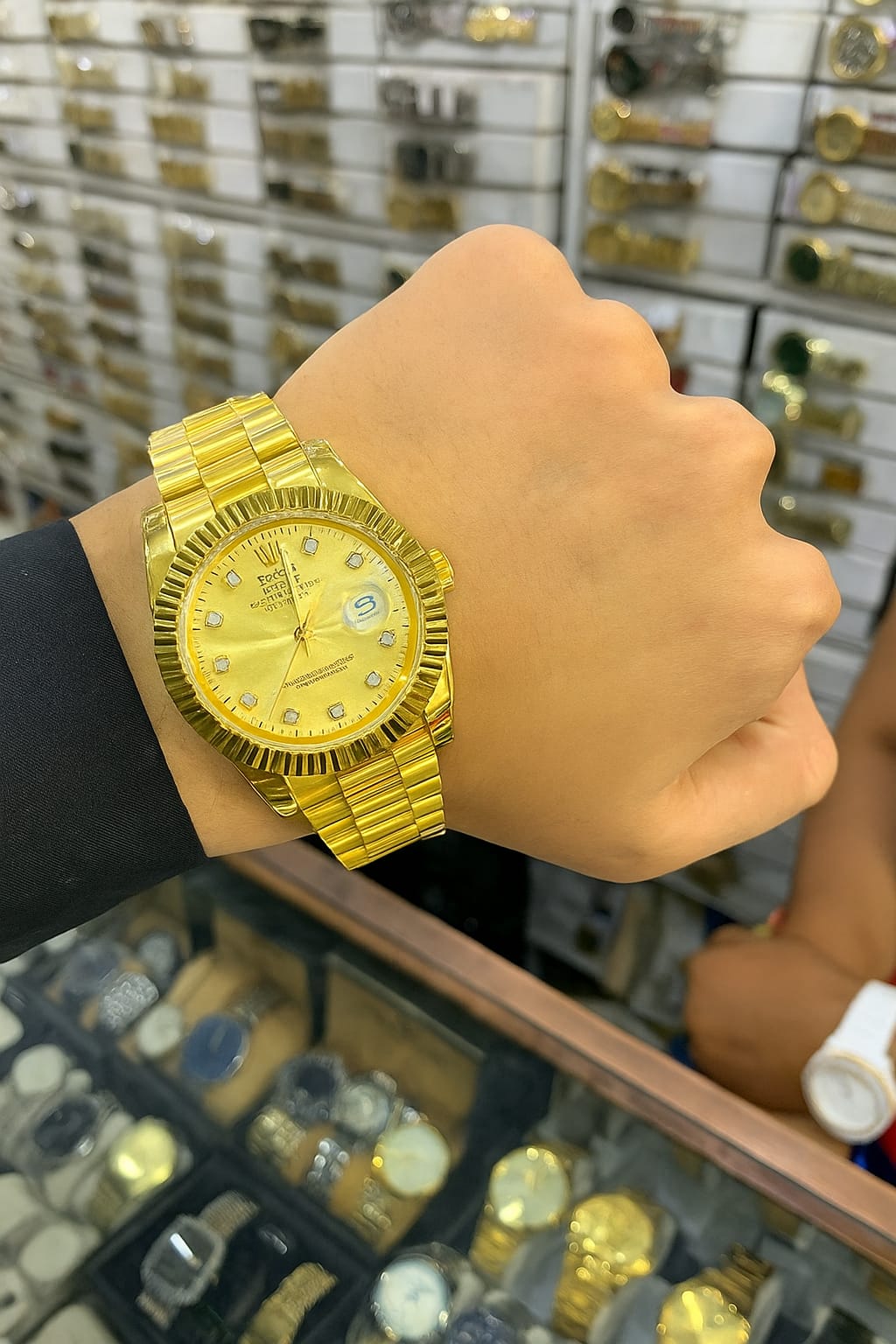 Rolex Day-Date premium Golden Dial
